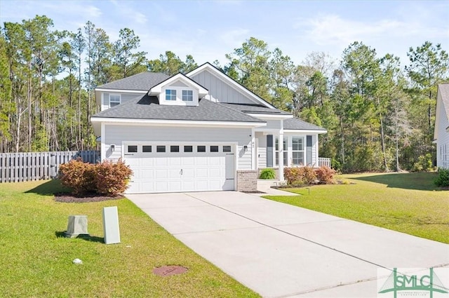 82 Rimmon Ct, Richmond Hill, GA 31324 - traditional home with a front yard, concrete driveway, an attached garage, fence, and a shingled roof