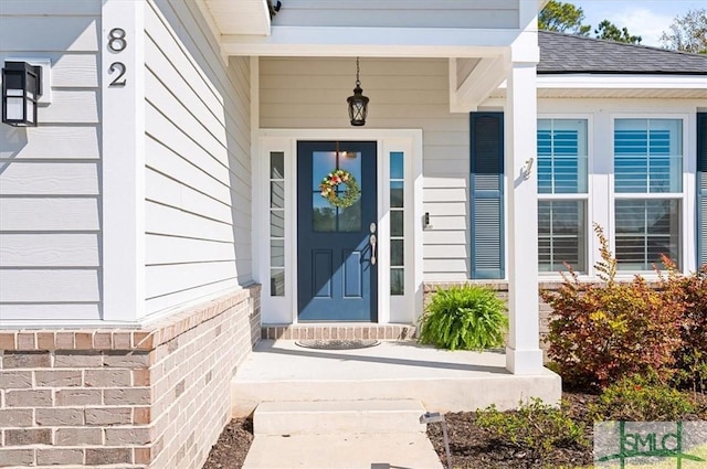 82 Rimmon Ct, Richmond Hill, GA 31324 - property entrance featuring a shingled roof
