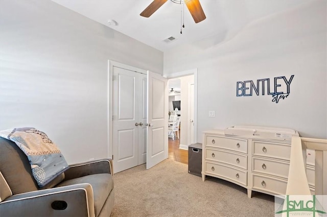 82 Rimmon Ct, Richmond Hill, GA 31324 - living area with a ceiling fan, light carpet, and visible vents
