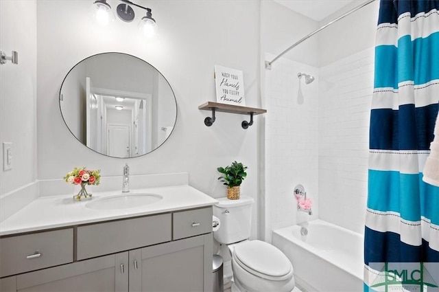 82 Rimmon Ct, Richmond Hill, GA 31324 - bathroom featuring toilet, shower / bath combo with shower curtain, and vanity