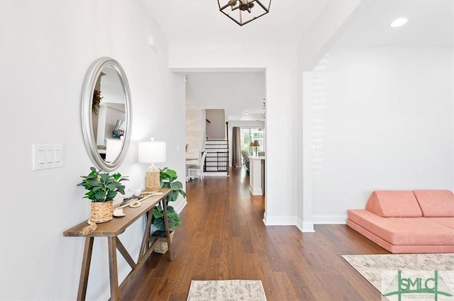82 Rimmon Ct, Richmond Hill, GA 31324 - hall with dark wood-type flooring, recessed lighting, baseboards, and stairway
