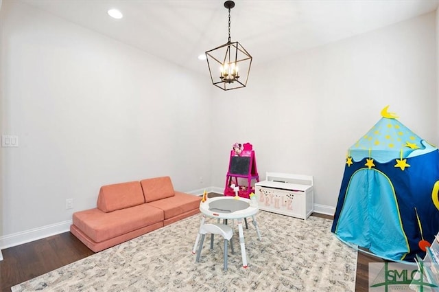 82 Rimmon Ct, Richmond Hill, GA 31324 - game room featuring baseboards, wood finished floors, recessed lighting, and a chandelier