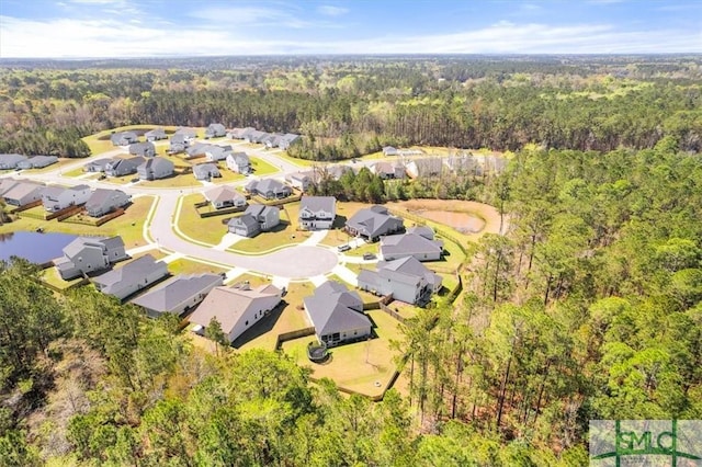82 Rimmon Ct, Richmond Hill, GA 31324 - birds eye view of property featuring a residential view and a wooded view