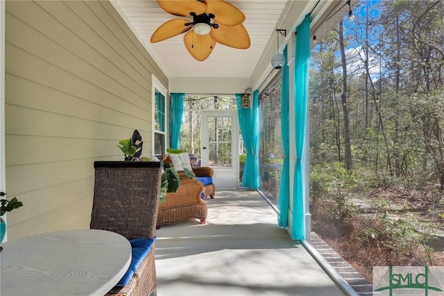 93 Bradford Pear Dr, Richmond Hill, GA 31324 - covered porch featuring a ceiling fan