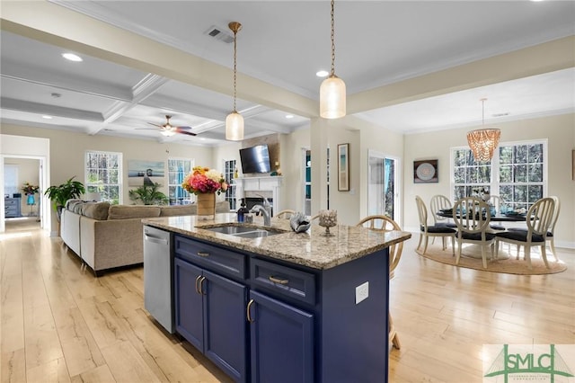 93 Bradford Pear Dr, Richmond Hill, GA 31324 - kitchen featuring stainless steel dishwasher, blue cabinetry, light wood-style flooring, light stone counters, and beamed ceiling