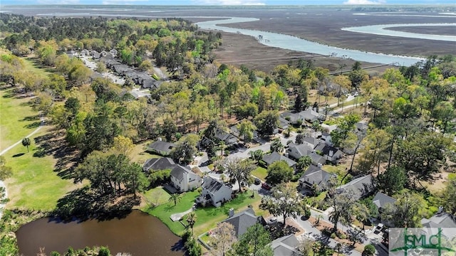 bird's eye view featuring a water view and a residential view