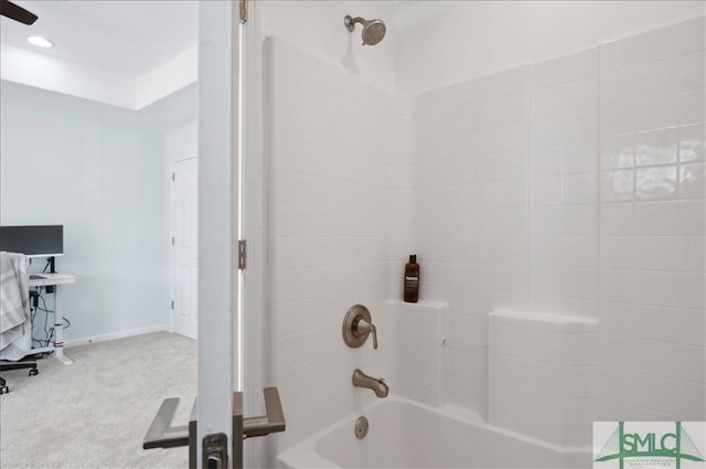 full bathroom featuring baseboards and shower / bath combination
