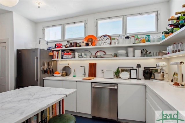 24 W Taylor St, Savannah, GA 31401 - kitchen with white cabinets, appliances with stainless steel finishes, open shelves, and light countertops