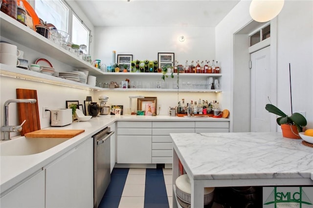 24 W Taylor St, Savannah, GA 31401 - interior space featuring dishwasher, a sink, bar, and light tile patterned floors