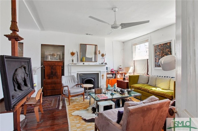 24 W Taylor St, Savannah, GA 31401 - living room featuring hardwood / wood-style flooring, a ceiling fan, visible vents, and a fireplace