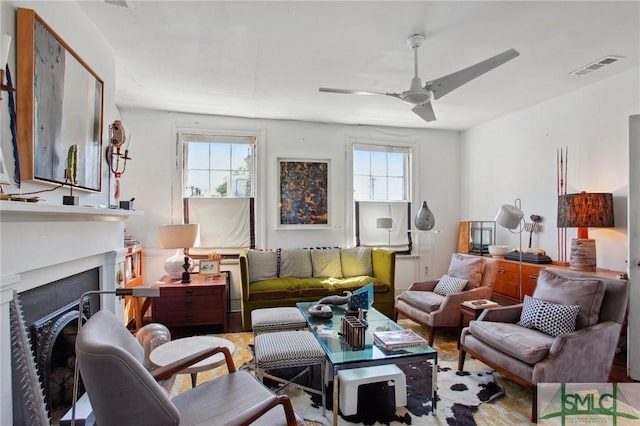 24 W Taylor St, Savannah, GA 31401 - living area featuring a ceiling fan, visible vents, and a fireplace