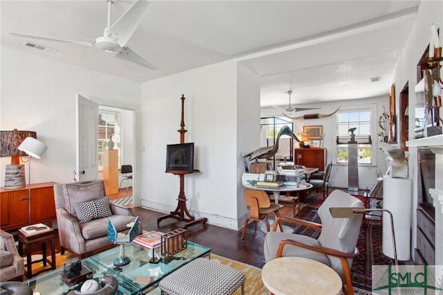 24 W Taylor St, Savannah, GA 31401 - living area with wood finished floors, baseboards, a ceiling fan, and visible vents