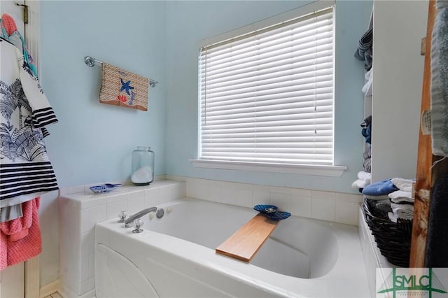 bathroom with a garden tub