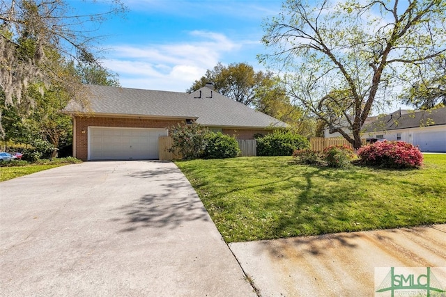 view of front of property with a garage, driveway, and brick siding