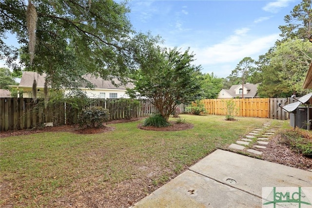 view of yard with a patio area