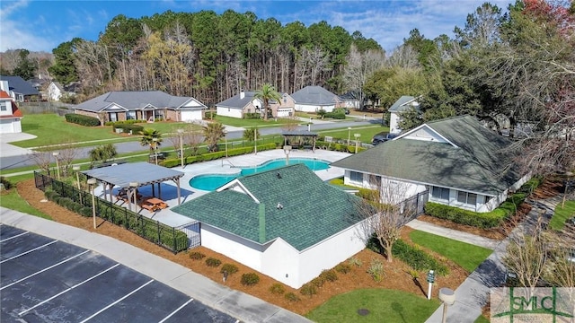 aerial perspective of suburban area with a pool area