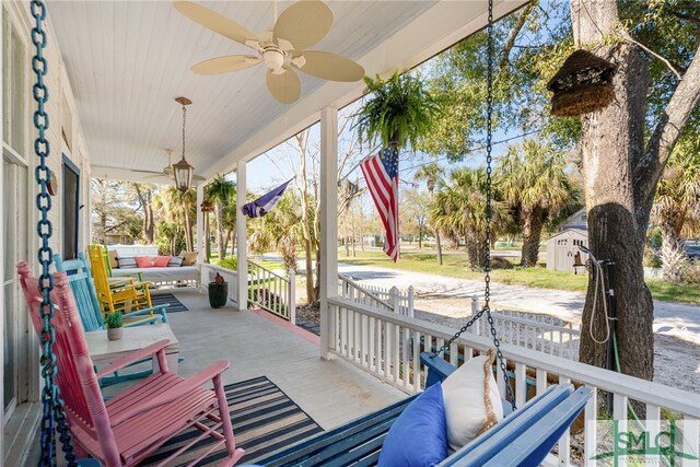 view of patio with covered porch and ceiling fan
