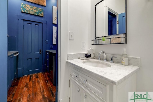 909 Howard St, Savannah, GA 31401 - bathroom with vanity and wood finished floors