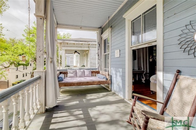 909 Howard St, Savannah, GA 31401 - balcony featuring a porch