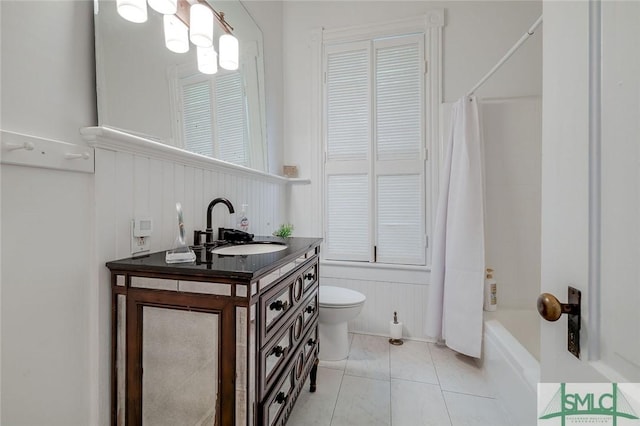 909 Howard St, Savannah, GA 31401 - bathroom with toilet, vanity, shower / bath combo, and wainscoting
