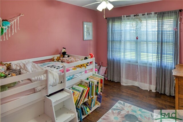 bedroom featuring wood finished floors and ceiling fan