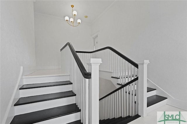 306 E Victory Dr, Savannah, GA 31405 - staircase with an inviting chandelier and crown molding