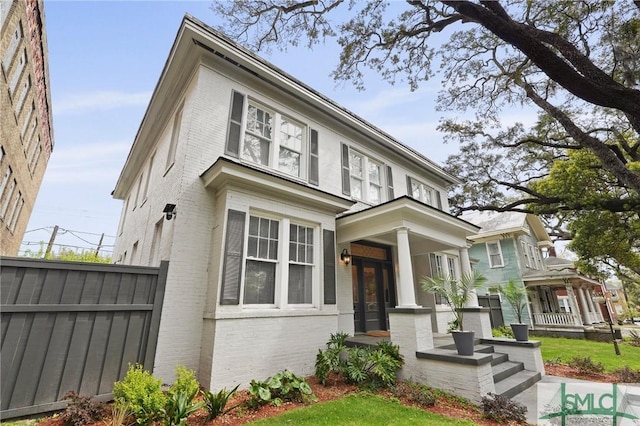 306 E Victory Dr, Savannah, GA 31405 - view of front of property featuring brick siding and fence