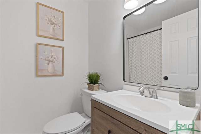 306 E Victory Dr, Savannah, GA 31405 - full bathroom with vanity and toilet