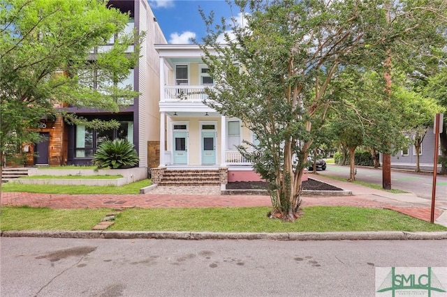 420 E Bolton St, Savannah, GA 31401 - view of front of house featuring a porch and a balcony