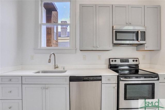 420 E Bolton St, Savannah, GA 31401 - kitchen featuring a sink, light countertops, and appliances with stainless steel finishes