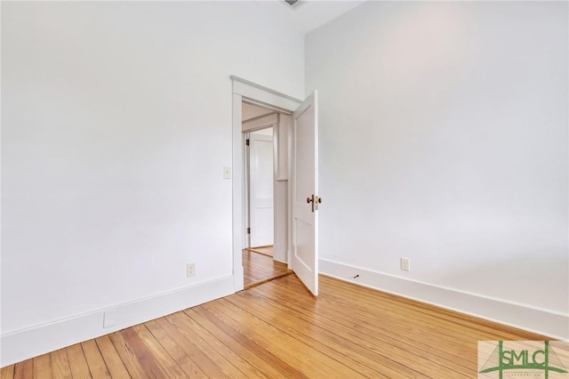 420 E Bolton St, Savannah, GA 31401 - spare room featuring baseboards and light wood-type flooring