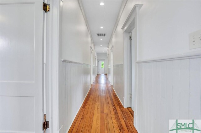 420 E Bolton St, Savannah, GA 31401 - hall featuring visible vents, a wainscoted wall, recessed lighting, and wood-type flooring