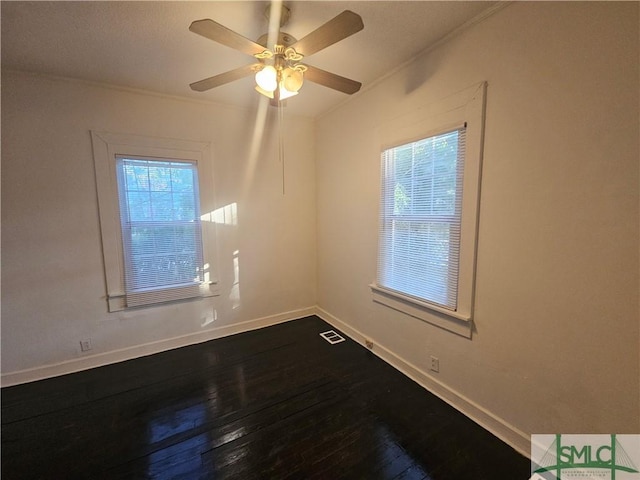 638 E 37th St, Savannah, GA 31401 - spare room featuring dark wood-style flooring, baseboards, ornamental molding, and ceiling fan