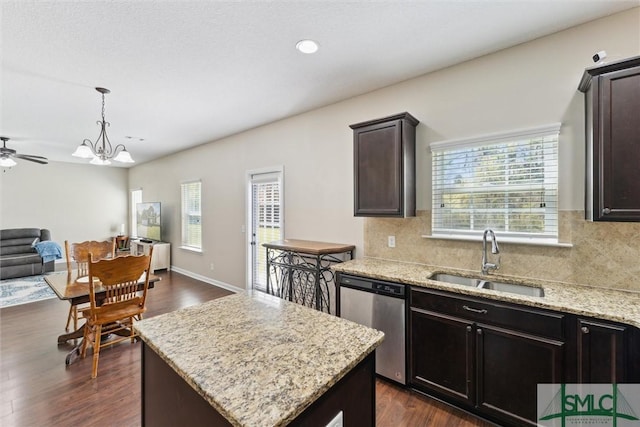 646 Red Oak Ln, Hinesville, GA 31313 - kitchen with open floor plan, a sink, tasteful backsplash, and dishwasher