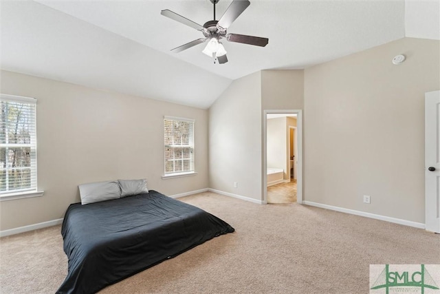 646 Red Oak Ln, Hinesville, GA 31313 - bedroom with carpet floors, multiple windows, and vaulted ceiling