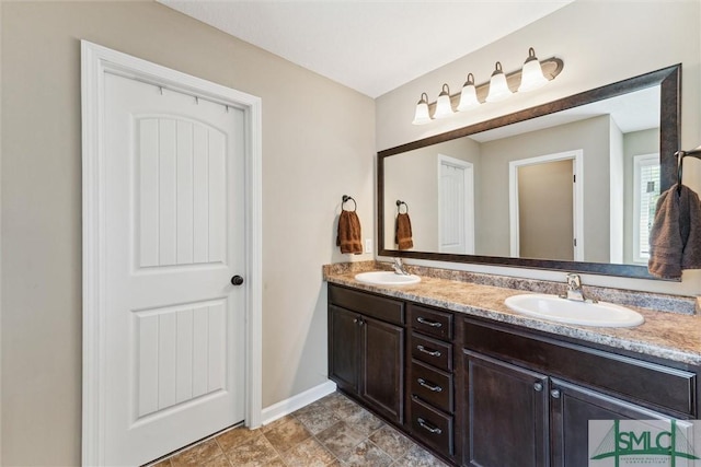 646 Red Oak Ln, Hinesville, GA 31313 - full bath featuring baseboards, double vanity, and a sink