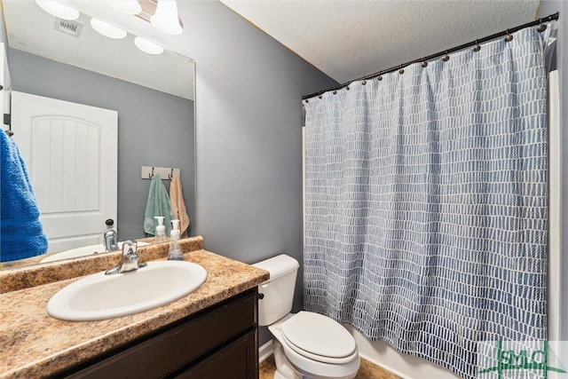 646 Red Oak Ln, Hinesville, GA 31313 - bathroom featuring toilet, vanity, a shower with curtain, a textured ceiling, and visible vents