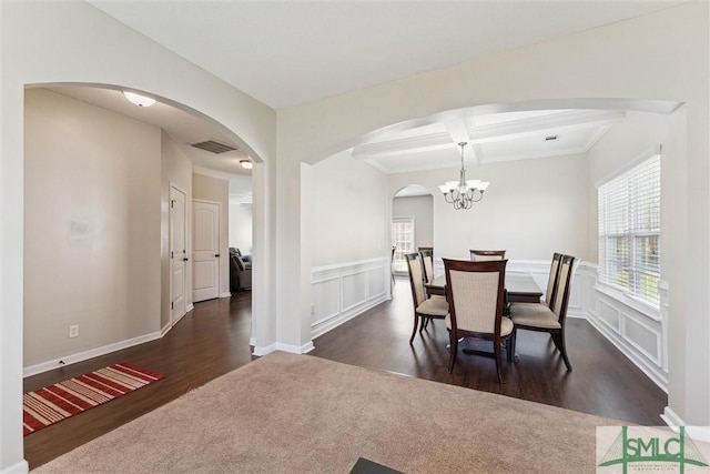 646 Red Oak Ln, Hinesville, GA 31313 - dining room featuring arched walkways, visible vents, a healthy amount of sunlight, and coffered ceiling