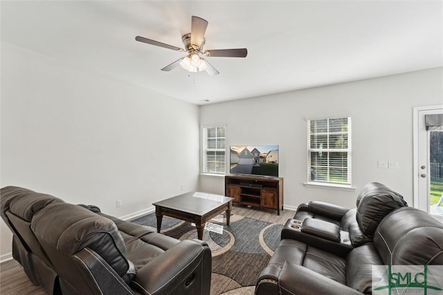 148 Spring Hill Dr, Richmond Hill, GA 31324 - living area with baseboards, wood finished floors, and ceiling fan