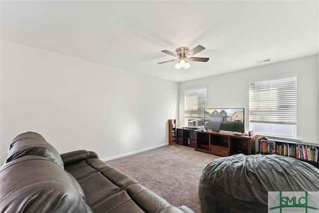 148 Spring Hill Dr, Richmond Hill, GA 31324 - living room with baseboards, carpet floors, visible vents, and a ceiling fan