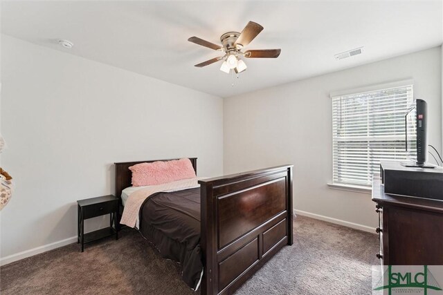 148 Spring Hill Dr, Richmond Hill, GA 31324 - carpeted bedroom featuring baseboards, ceiling fan, and visible vents