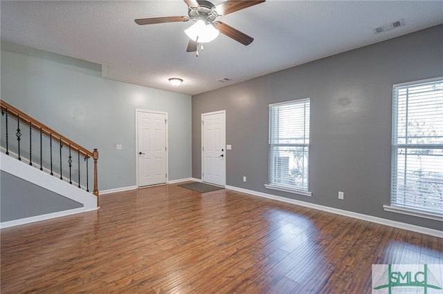 402 Walthour Dr, Rincon, GA 31326 - entryway with stairway, healthy amount of natural light, and wood finished floors