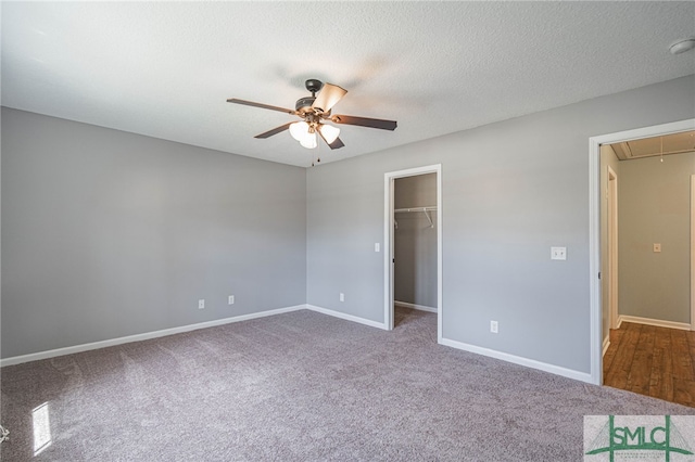 402 Walthour Dr, Rincon, GA 31326 - unfurnished bedroom with attic access, carpet, a spacious closet, baseboards, and a closet