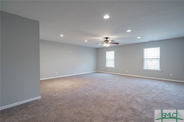 402 Walthour Dr, Rincon, GA 31326 - carpeted empty room with a ceiling fan, a textured ceiling, recessed lighting, and baseboards
