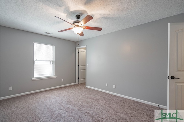 402 Walthour Dr, Rincon, GA 31326 - unfurnished room featuring a ceiling fan, a textured ceiling, carpet flooring, and baseboards