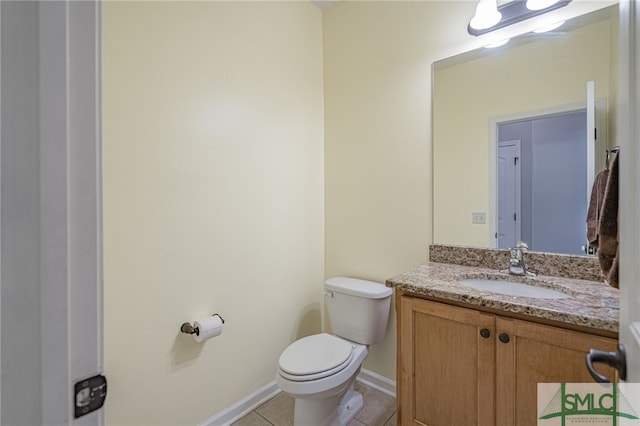 402 Walthour Dr, Rincon, GA 31326 - half bath with tile patterned flooring, toilet, vanity, and baseboards