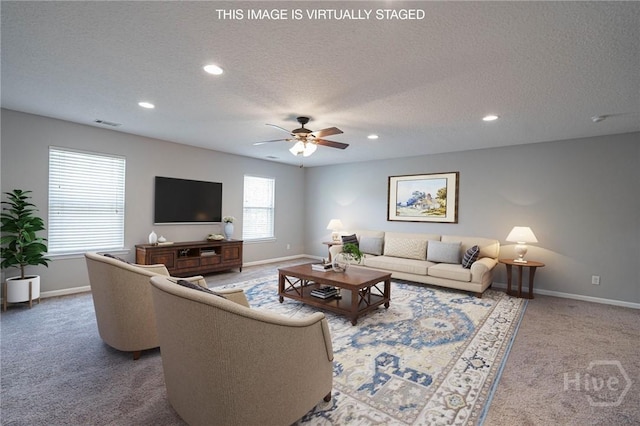 402 Walthour Dr, Rincon, GA 31326 - living room featuring carpet, baseboards, a textured ceiling, recessed lighting, and ceiling fan