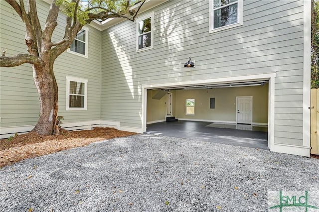 exterior space with driveway and an attached garage