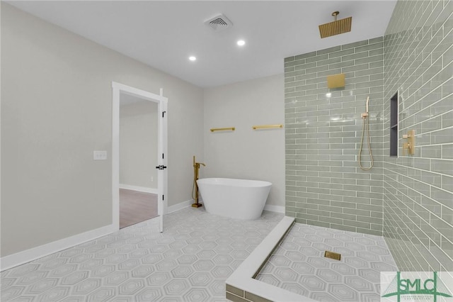 bathroom featuring tiled shower, a soaking tub, tile patterned floors, visible vents, and recessed lighting