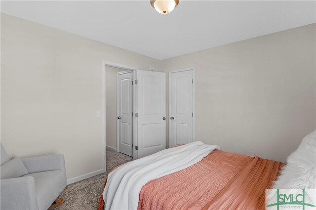 218 Herty Ln, Hinesville, GA 31313 - carpeted bedroom featuring baseboards